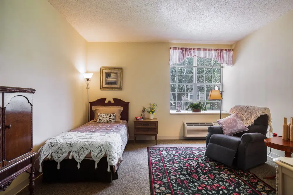 Model apartment bedroom at American House Murfreesboro, a retirement community in Murfreesboro, Tennessee